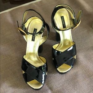 Dolce & Gabbana sandals.